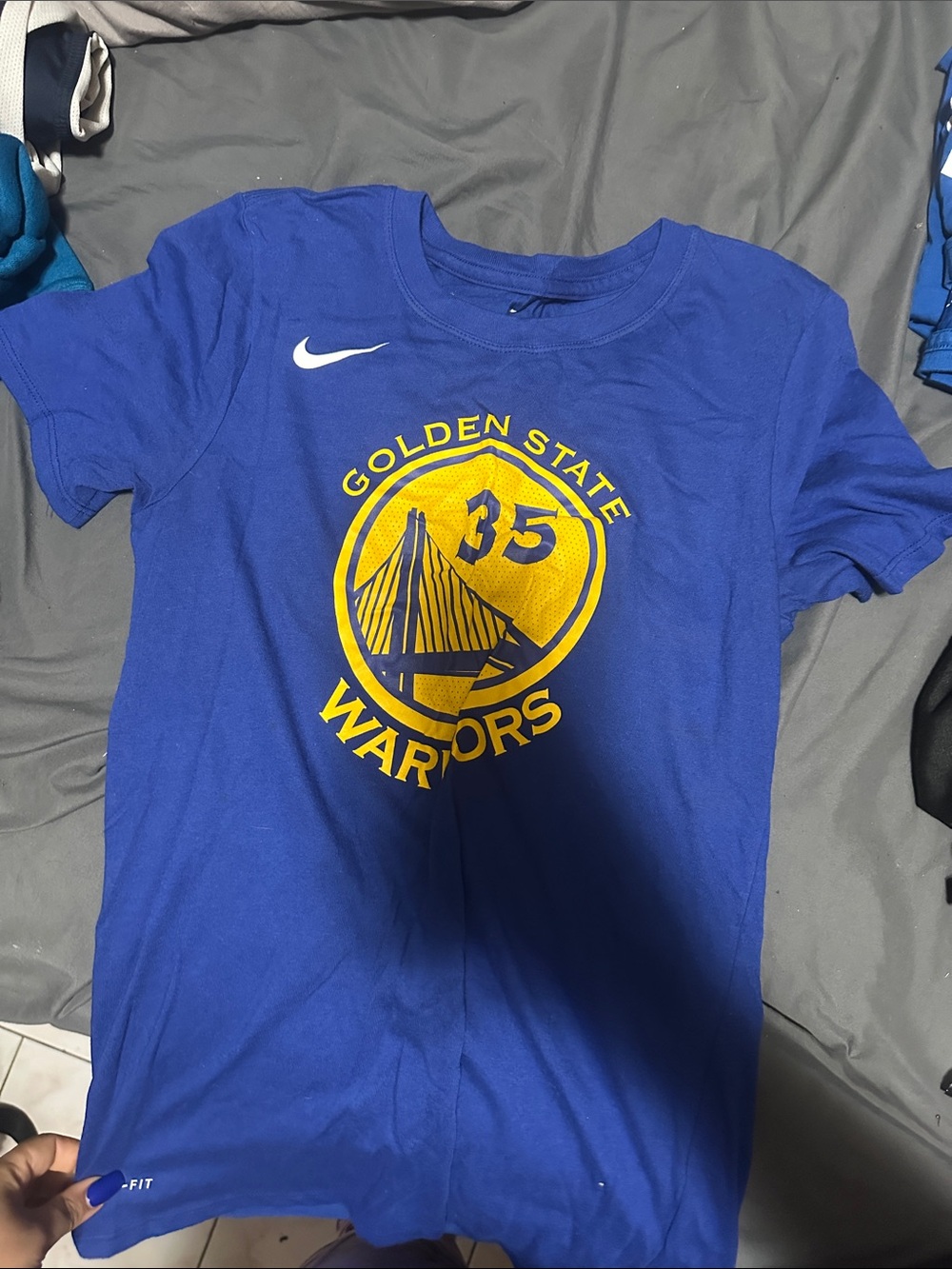 Nike Blue Golden State Warriors Logo Tee with Yellow Graphic